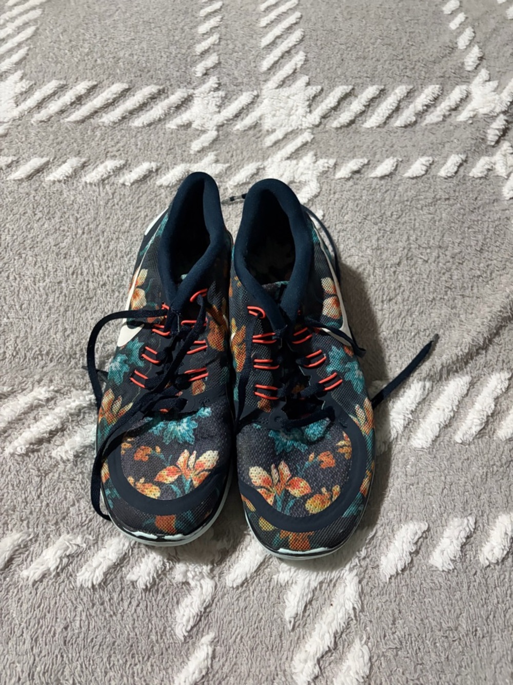 Nike Women's Navy Floral Athletic Sneakers with Orange Accents